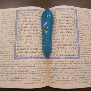 Talking Quran set with digital pen enabling instant audio playback for Quran reading and learning
